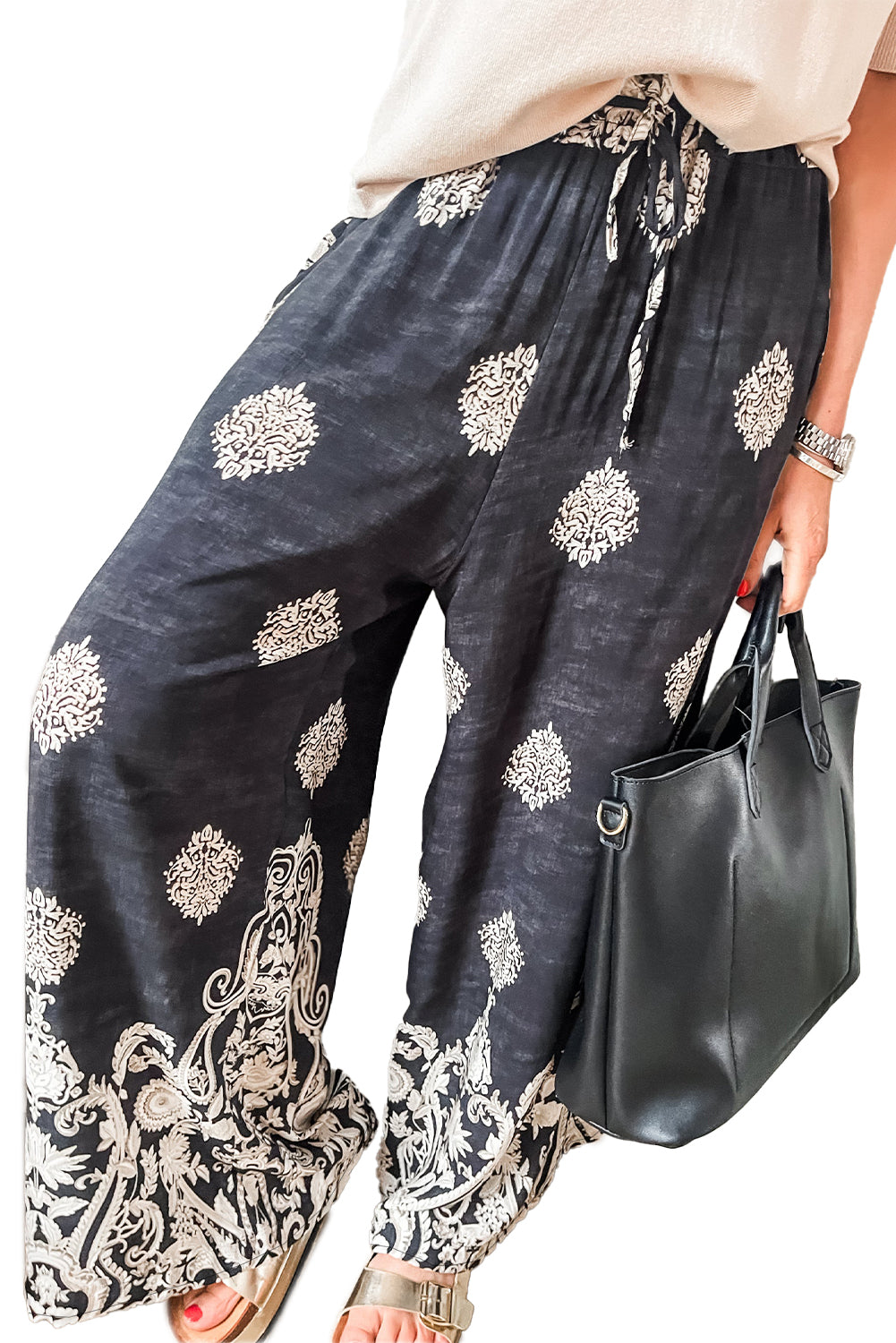 Pantalones anchos con cintura con cordón y estampado bohemio negro